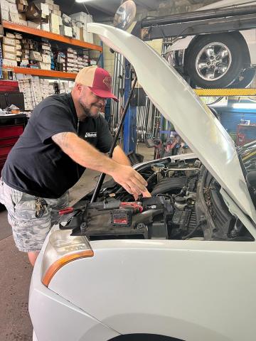 Mechanic working on engine